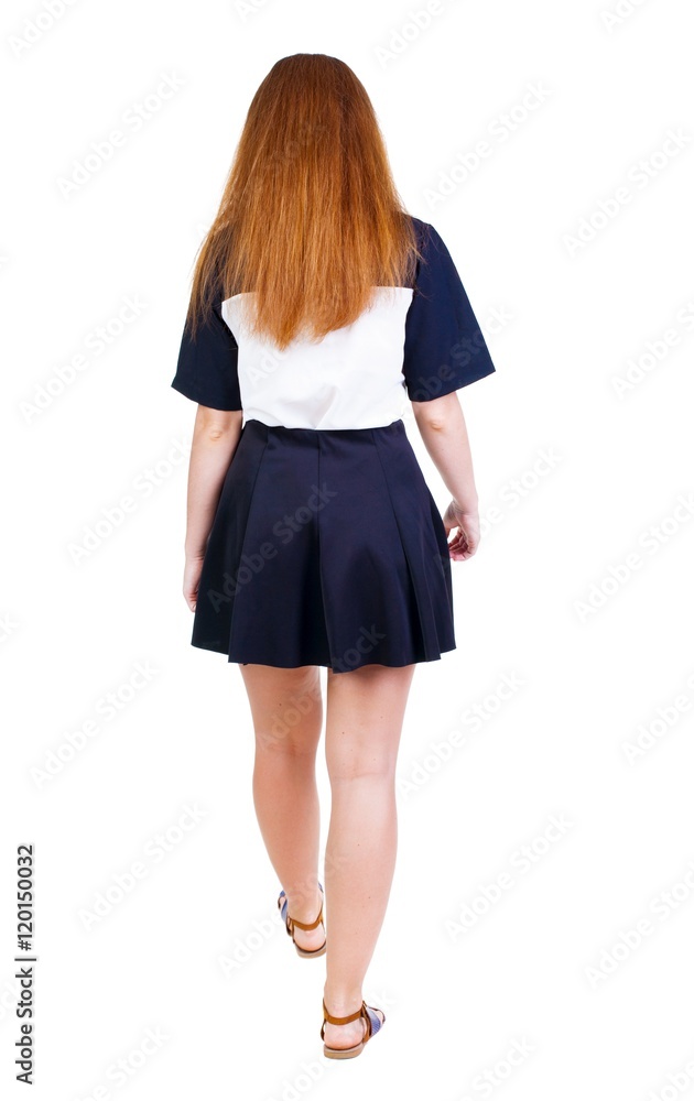back view of walking woman in dress. beautiful redhead girl in motion. backside view of person. Rear view people collection. Isolated over white background. back view of walking woman in dress. beautiful redhead girl in motion. backside view of person. Rear view people collection. Isolated over white background.