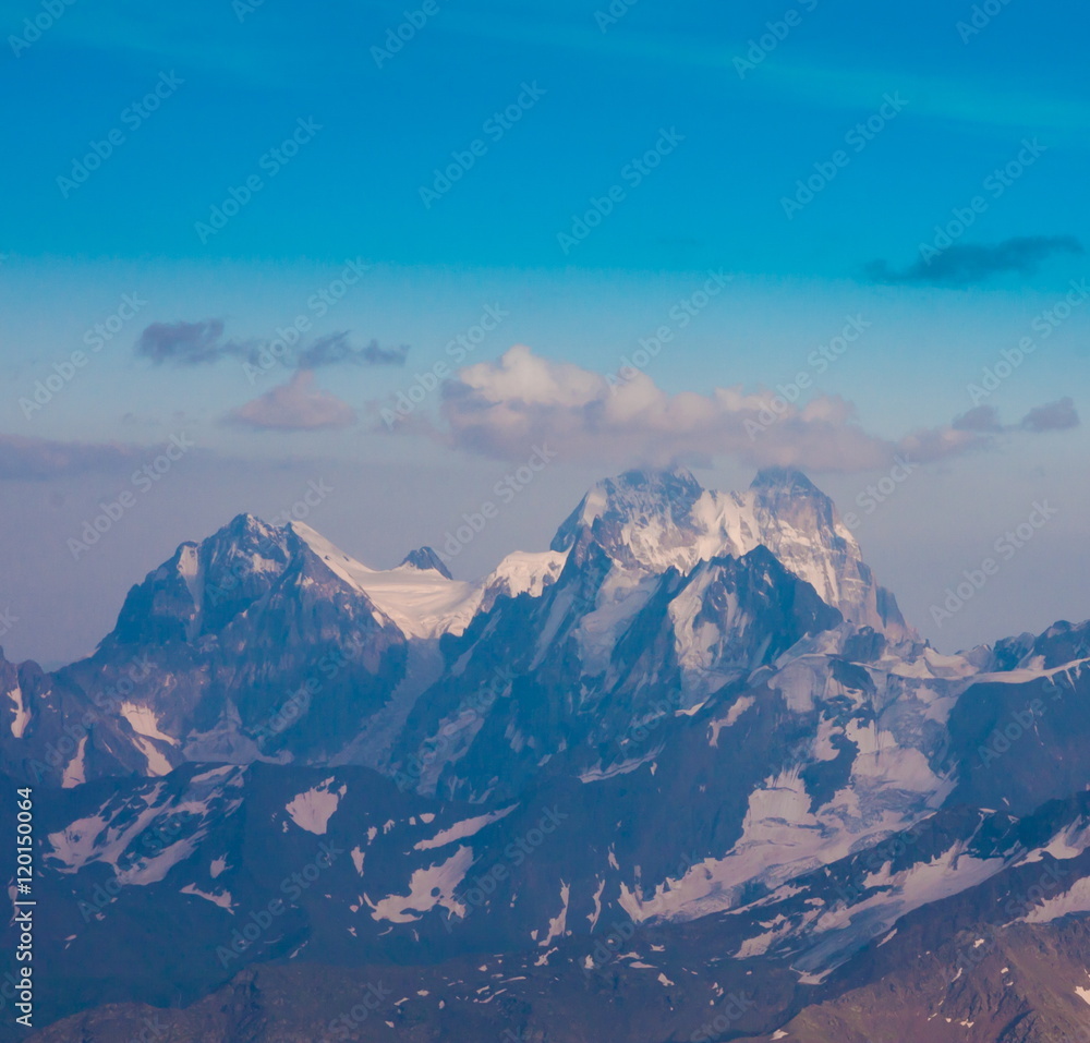 Mountain summer. Sunset. Elbrus. Snow and glacier