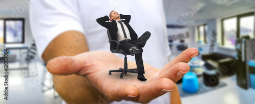Man relaxing on his chair at the office
