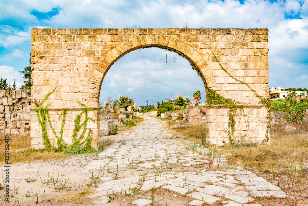 Arch in Tyre, Lebanon. It is located about 80 km south of Beirut. Tyre has led to its designation as a UNESCO World Heritage Site in 1984.