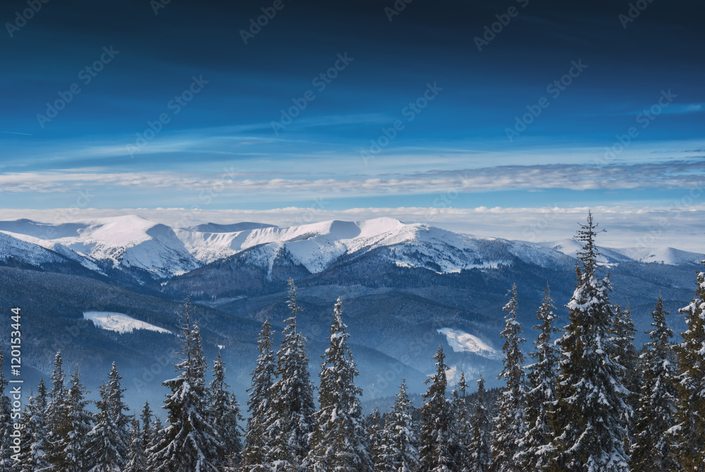 Mountain ridge covered with fresh white snow