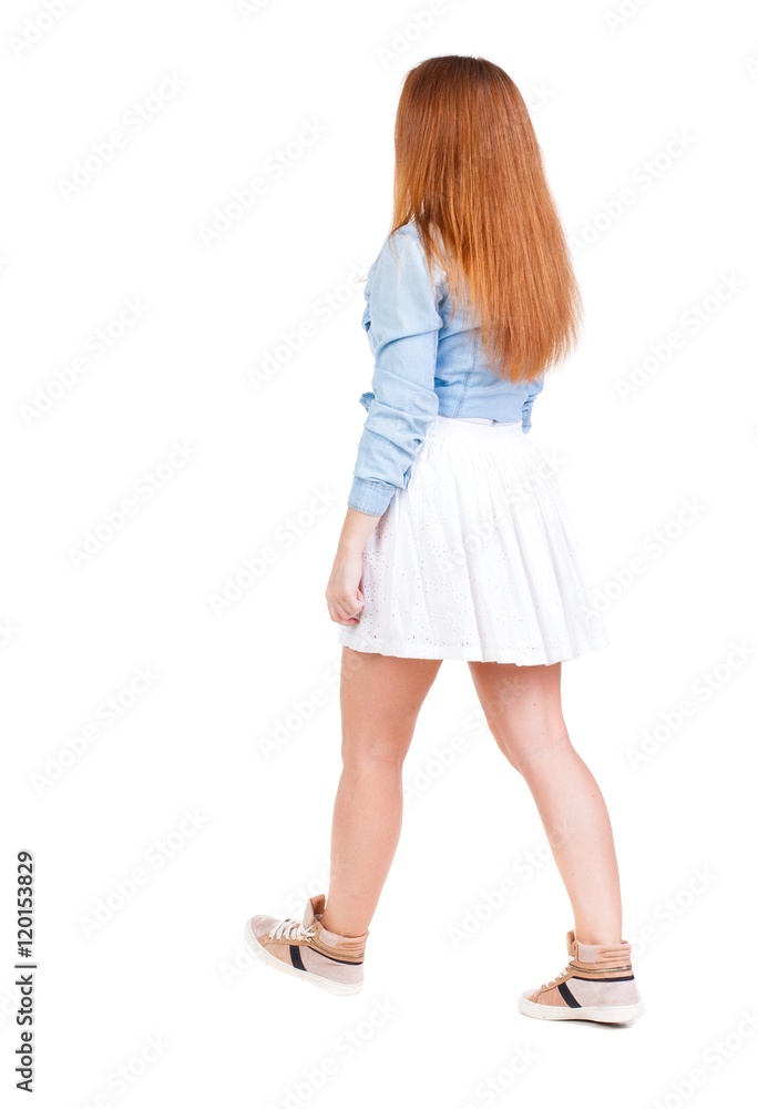back view of walking woman in dress. beautiful redhead girl in motion. backside view of person. Rear view people collection. Isolated over white background. back view of walking woman in dress. beautiful redhead girl in motion. backside view of person. Rear view people collection. Isolated over white background.