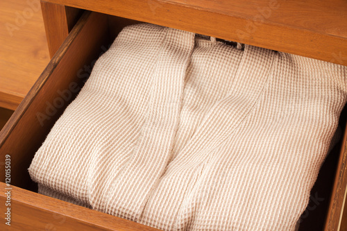 Bathrobe in wooden drawer