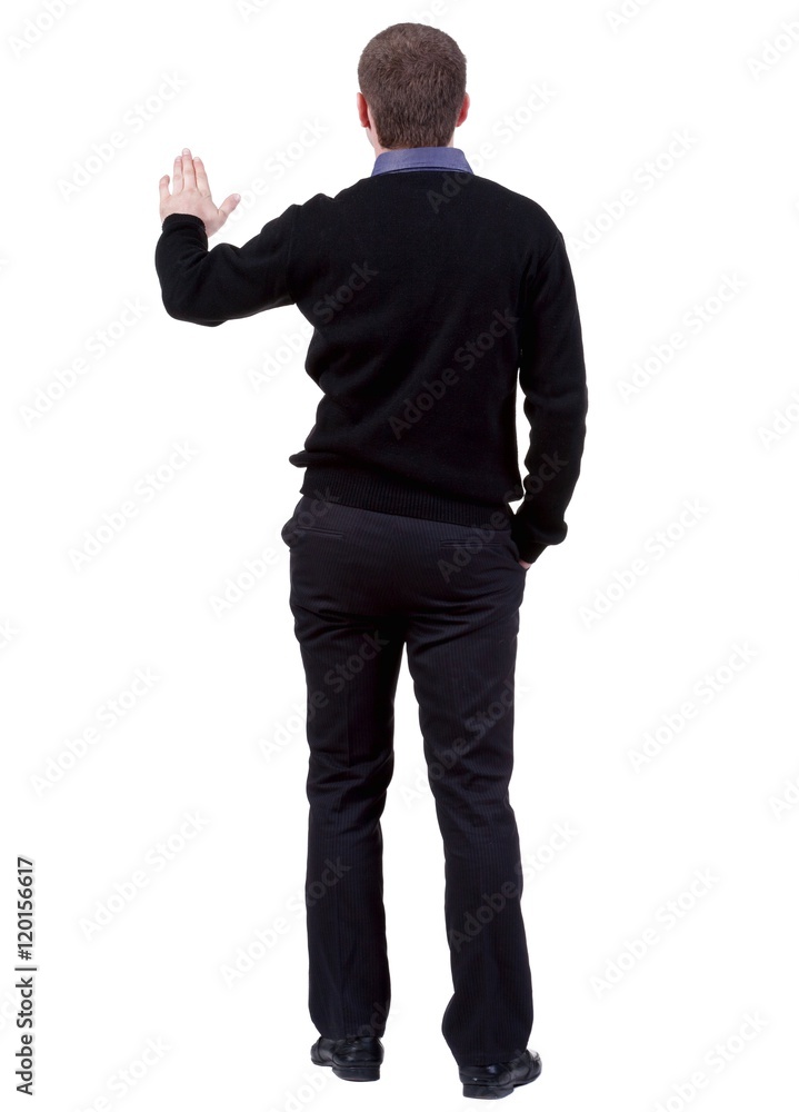 back view of Businessman . Young guy in black suit watching. Isolated over white background. Rear view people collection. backside view of person. back view of Businessman . Young guy in black suit watching. Isolated over white background. Rear view people collection. backside view of person.