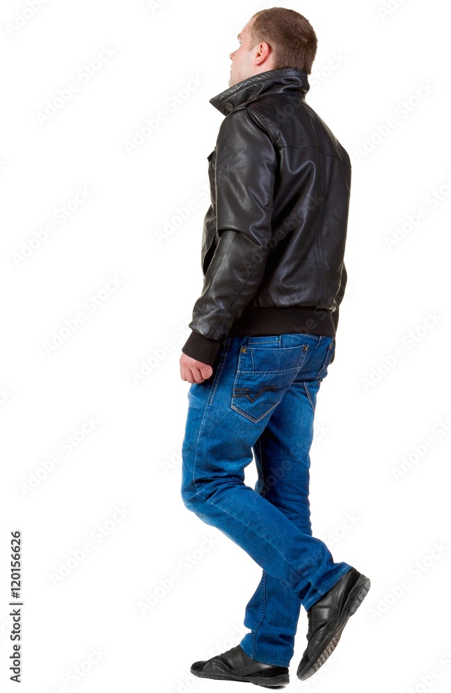 Back view of going handsome man in jeans and jacket. walking young guy in jeans and jacket. Rear view people collection. backside view of person. Isolated over white background. Back view of going handsome man in jeans and jacket. walking young guy in jeans and jacket. Rear view people collection. backside view of person. Isolated over white background.