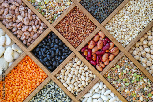 Collection assorted of lentils, beans, peas, grain, groats, soybeans, food background