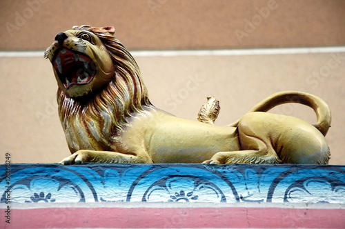 Photography Ancient sculpture of a lion in Hindu temple in Kuala Lumpur, Malaysia