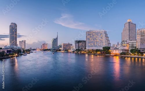 Fototapeta Naklejka Na Ścianę i Meble -  Bangkok city with business building and water traffic at chao pr