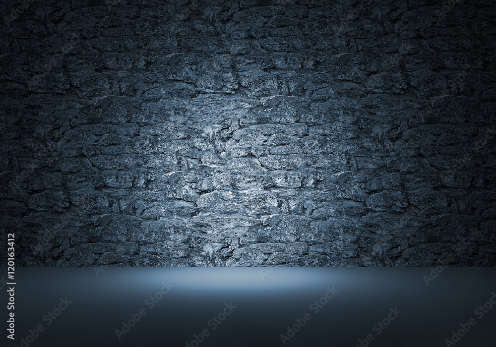 stone wall background with spotlight stone wall background with spotlight