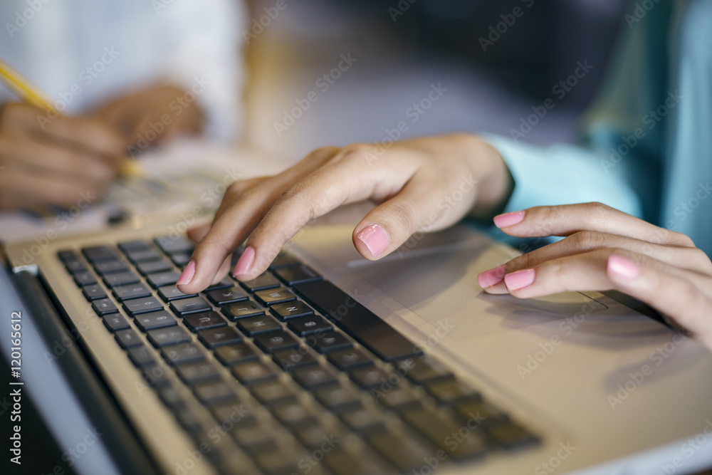 woman touching track pad on a laptop
woman touching track pad on a laptop