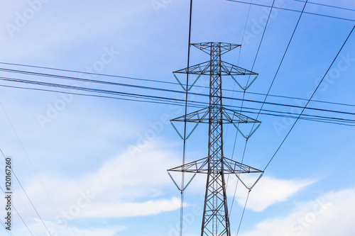 high voltage electric pole with blue sky, horizintal picture
