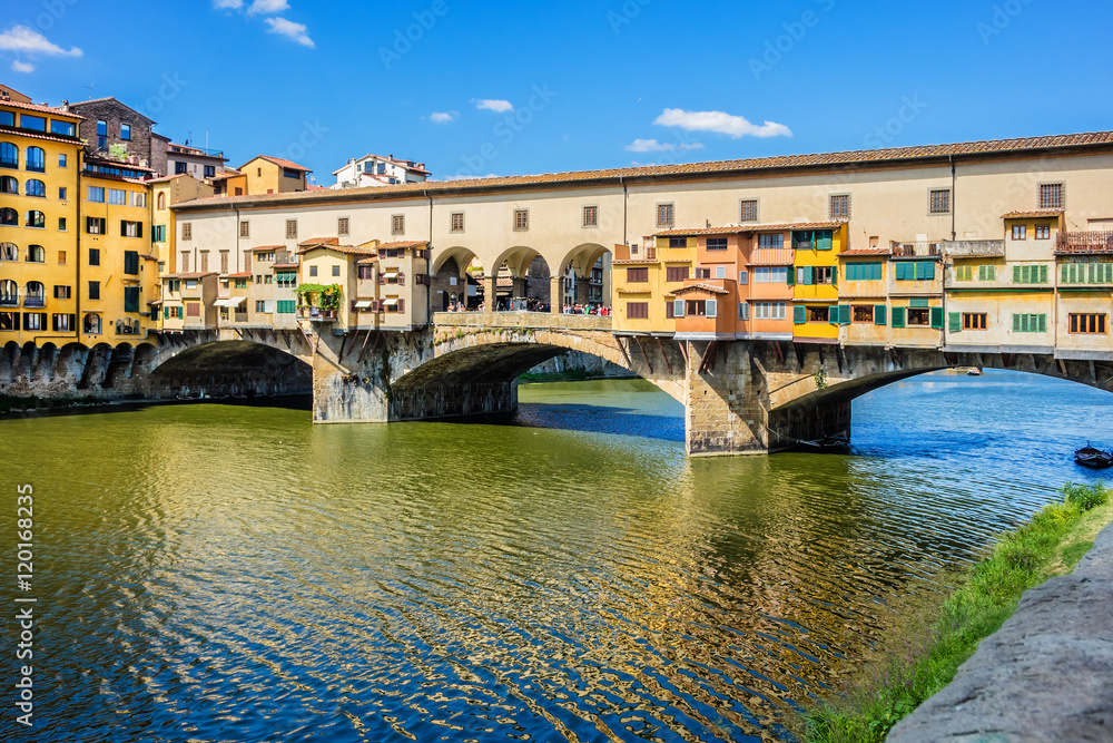 Bridge Ponte Vecchio (1345) on Arno river in Florence, Italy.