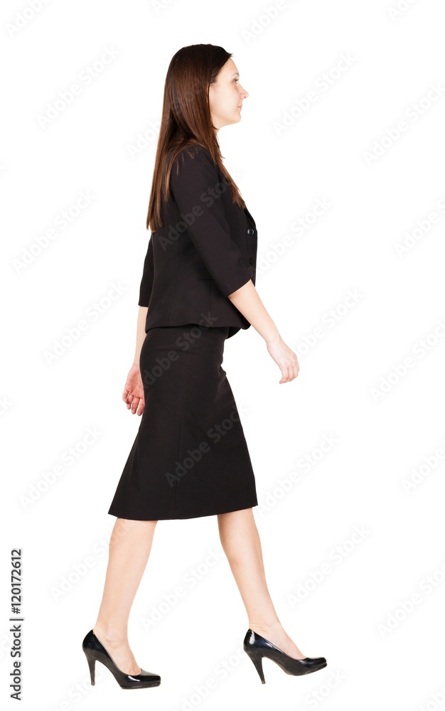walking business woman. back view. going young girl in suit. Rear view people collection. back side view of person. Isolated over white background. walking business woman. back view. going young girl in suit. Rear view people collection. back side view of person. Isolated over white background.