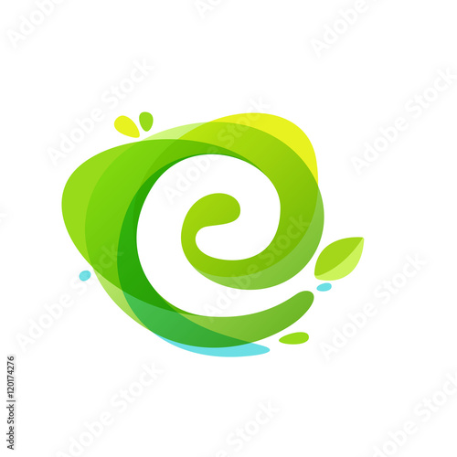 Letter E logo at green watercolor splash background.