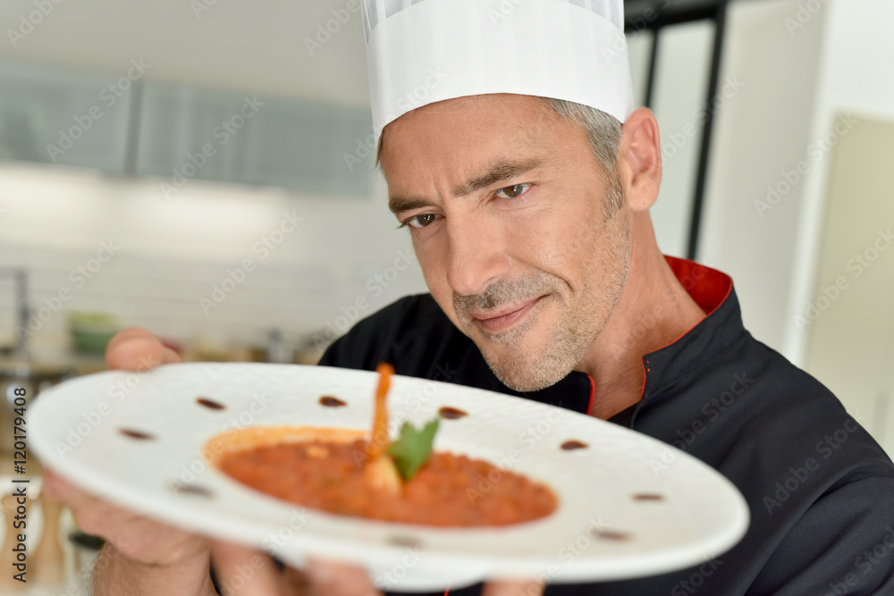 Restaurant chef presenting new dish Restaurant chef presenting new dish