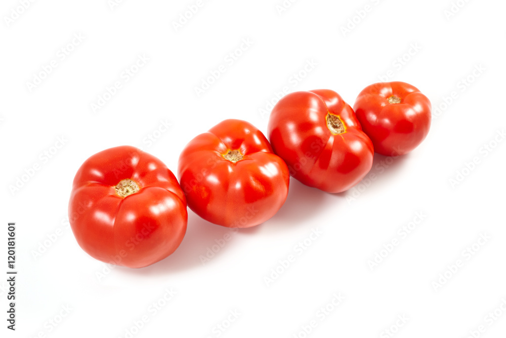 A tomato. Red tomato on a white background. Harvest vegetables. Autumn harvest. Red, juicy, ripe tomato. A tomato. Red tomato on a white background. Harvest vegetables. Autumn harvest. Red, juicy, ripe tomato.