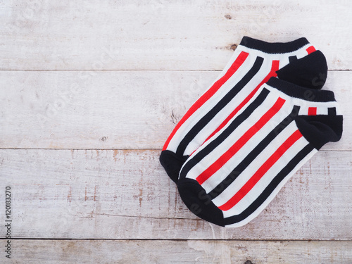 white socks with black and red striped