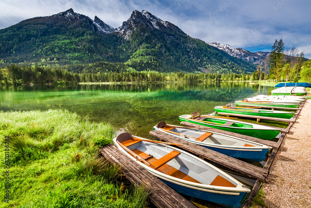 Few boats on the lake Hintersee in the Alps, Germany