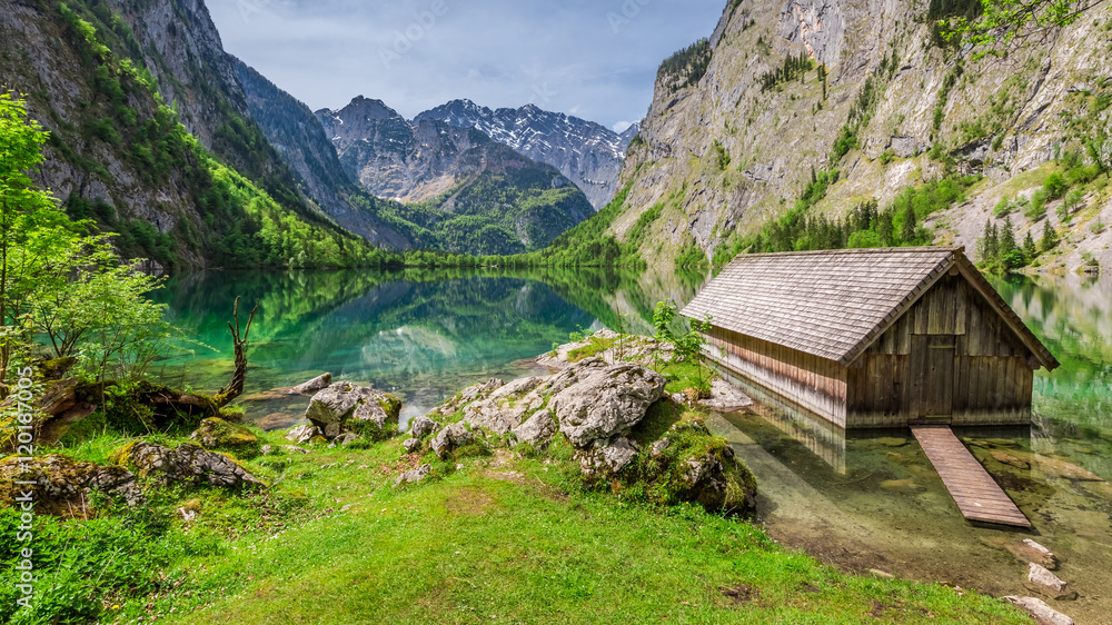 Little hut at the Obersee lake in German Alps