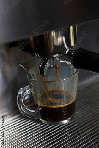 coffee making process from coffee machine in cafe shop
