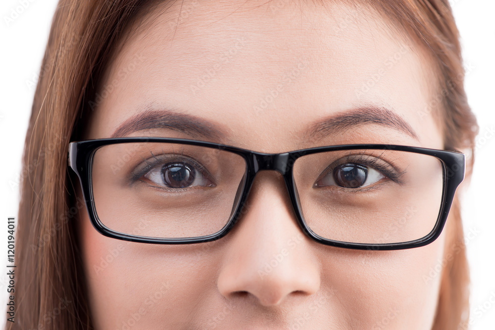 Closeup portrait of a young cheerful asian woman in glasses
