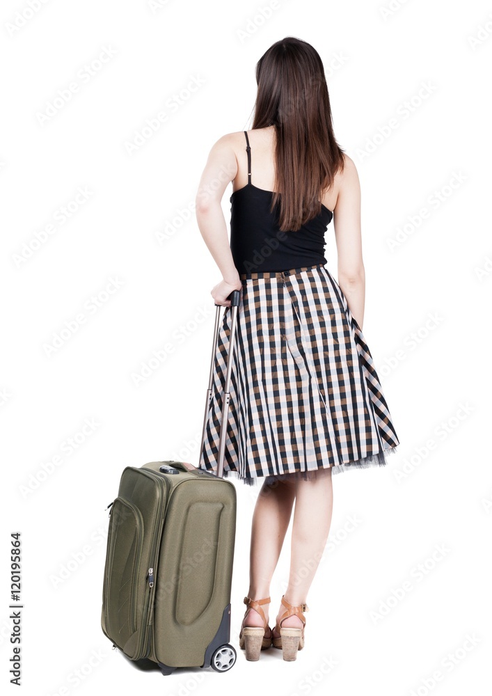 Back view of stylishly dressed brunette business woman with suitcase looking up. Standing young girl. Rear view people collection. backside view of person. Isolated over white background. languid Back view of stylishly dressed brunette business woman with suitcase looking up. Standing young girl. Rear view people collection. backside view of person. Isolated over white background. languid