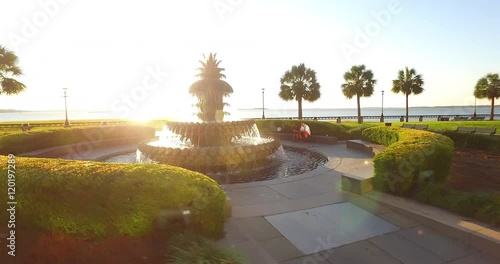 Aerial perspective coming down on the iconic Pineapple Fountain and Charleston Harbor from Charleston, SC. It’s located in downtown Charleston in Waterfront Park. photo