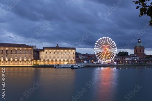 Big wheel in Toulouse near a cupola, France