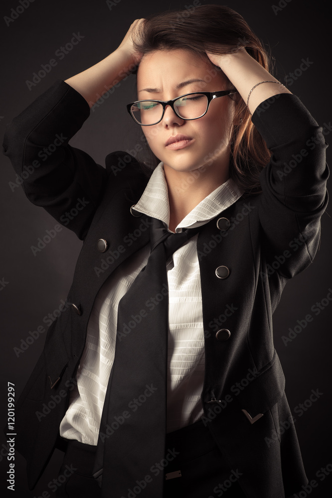 Korean teen girl in business suit holding hands hair Korean teen girl in business suit holding hands hair