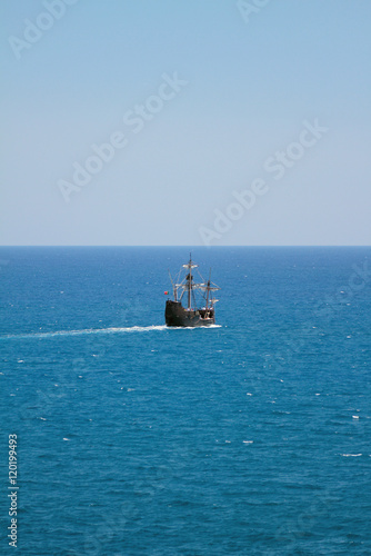 Two-mast sailing motorized vessel going to sea © photobeginner