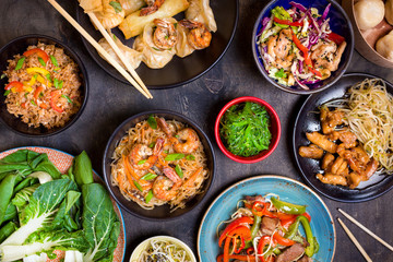 Chinese food on a dark table
