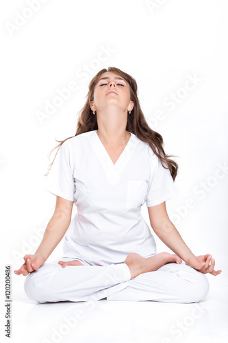 woman  sitting in the Lotus position © producer