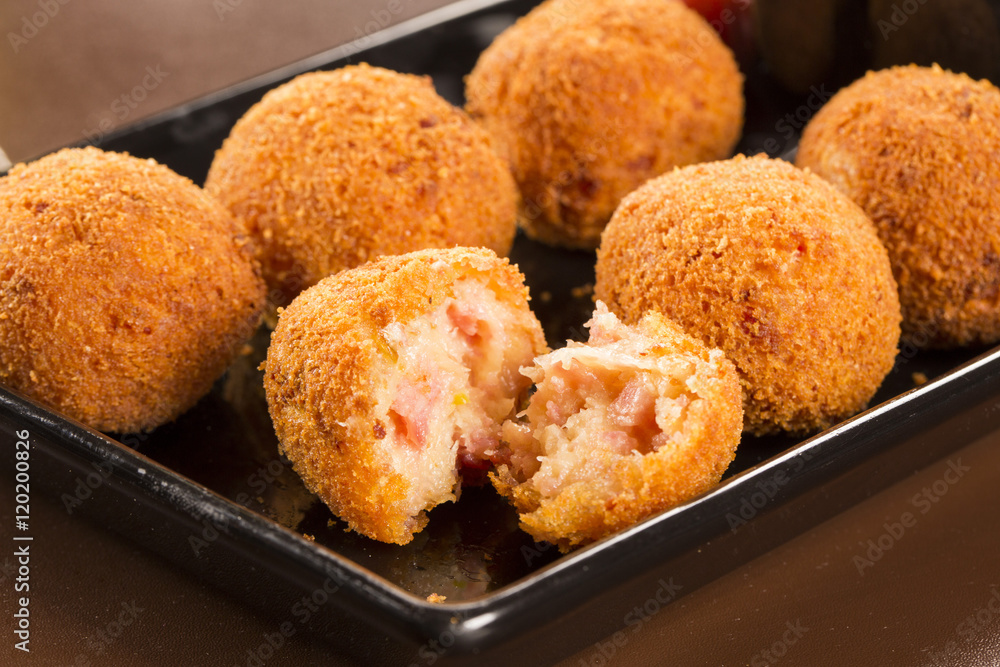 Brazilian deep fried cheese and ha snack, popular at local parti Brazilian deep fried cheese and ha snack, popular at local parti