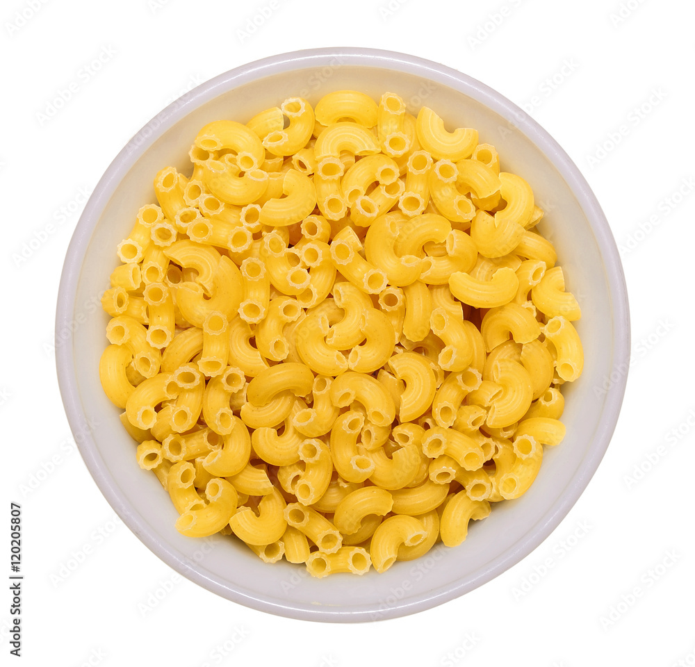 dry macaroni in white bowl isolated on white dry macaroni in white bowl isolated on white