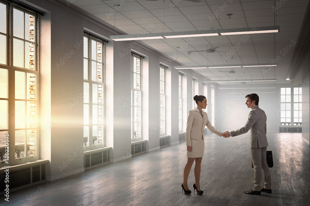 Business partners handshake . Mixed media Business partners handshake . Mixed media