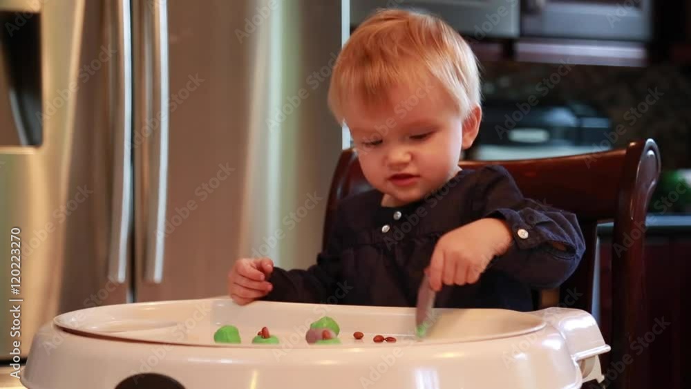 Little girl moulding plasticine