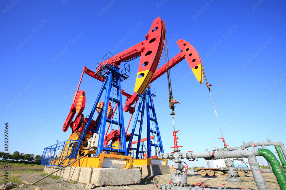 Oil field, oil pump in the work Oil field, oil pump in the work