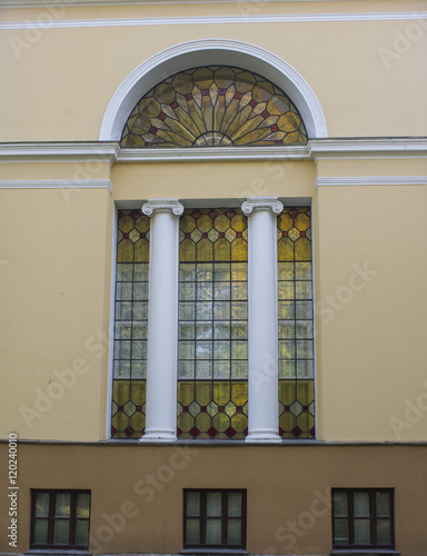 Palace with stained glass windows and columns photo