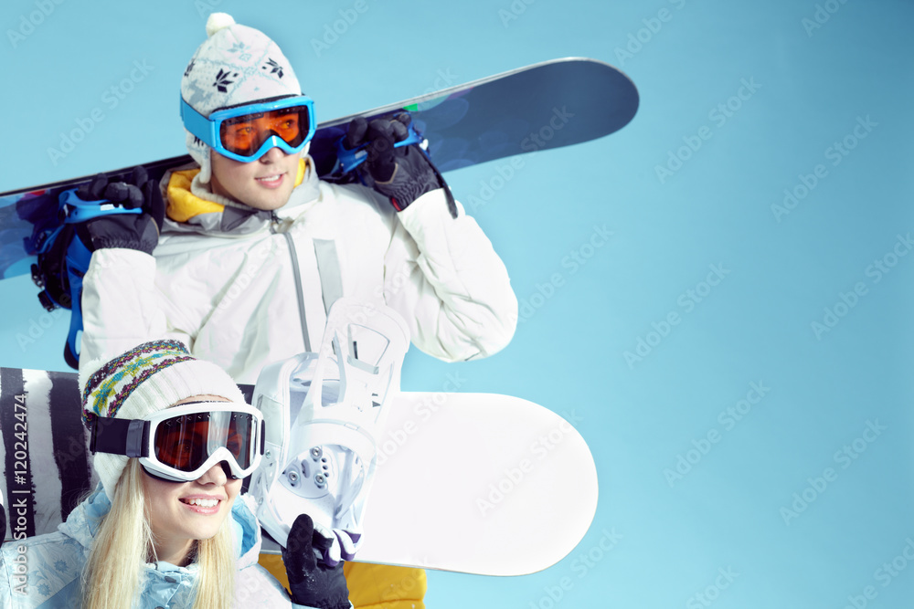 Portrait of two young adult snowboarders Portrait of two young adult snowboarders