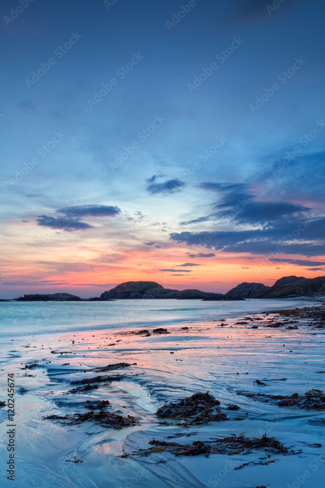 Stunning sunset on the beach of Iona, a small island of Inner Hebrides, Scotland