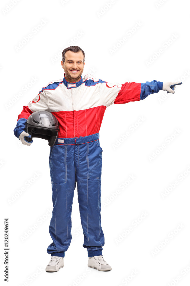 Race driver holding a helmet and pointing Race driver holding a helmet and pointing