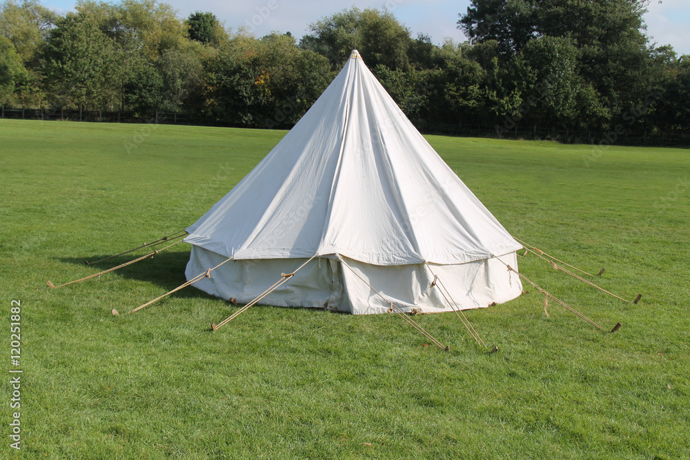 A Classic White Canvas Bell Shaped Camping Tent.