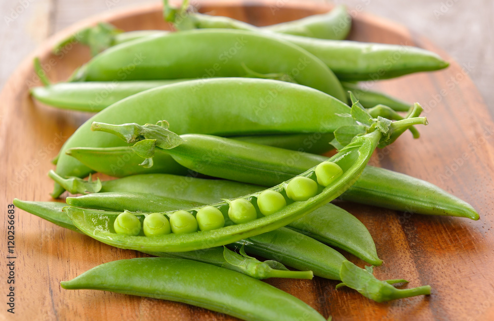 fresh green pea on wooden background fresh green pea on wooden background