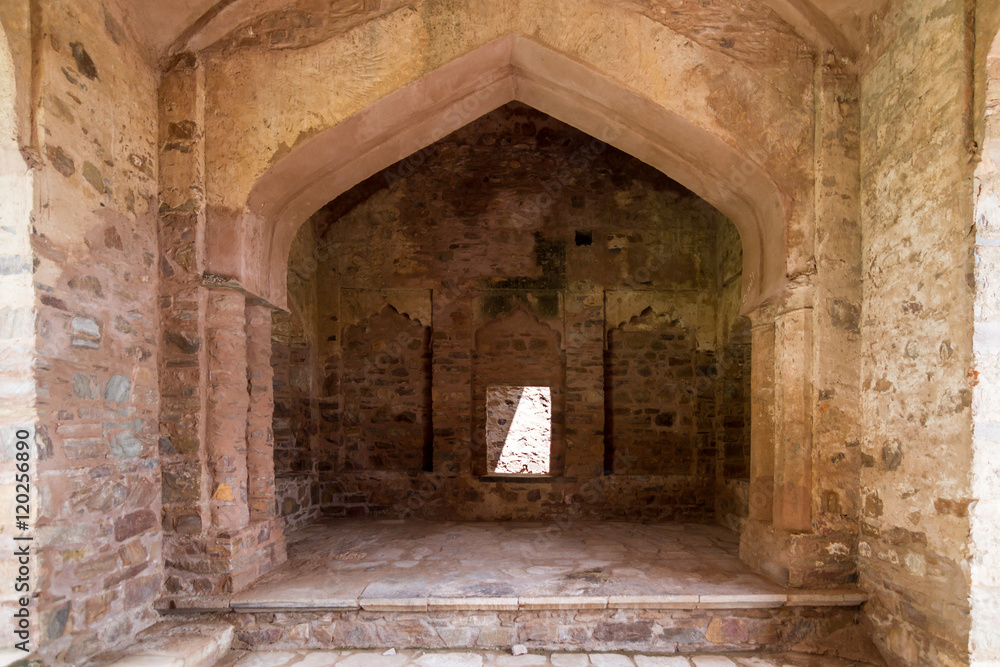 The historical ruins of the now famous Bhangarh Fort with ruins of temples, shops, gates and ramparts in the Rajgarh municipality of the Alwar district in the state of Rajasthan in India 