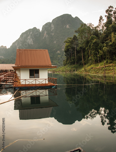 Scenic and unique landscape with floating houses at Chieou Laan photo