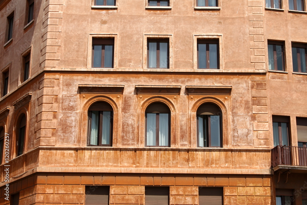 Windows of old house. Mediterranean architecture in Rome, Italy.
