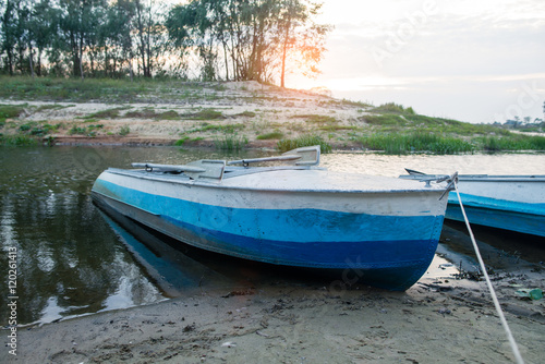 old metal boat on the river