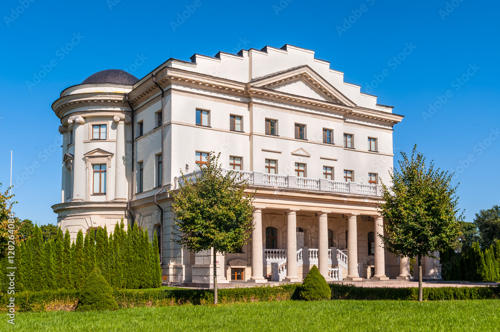 Razumovsky palace on a sunny day in Baturin, Ukraine (1803, arch