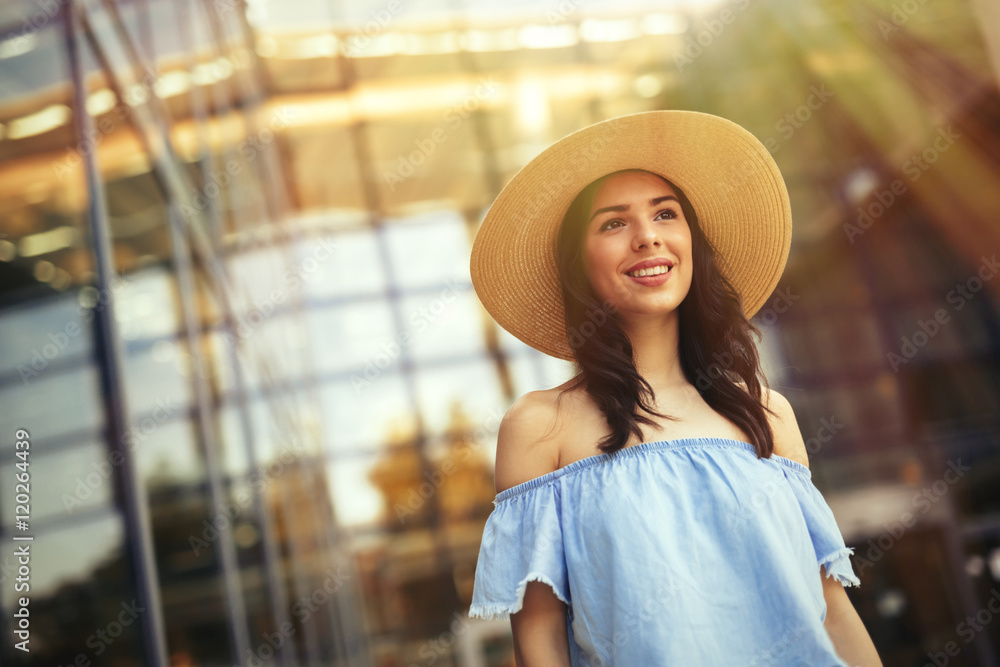 Happy female outdoor wearing a hat