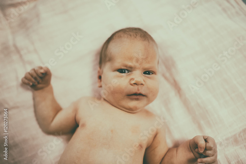 Little newborn doubtful of world photo